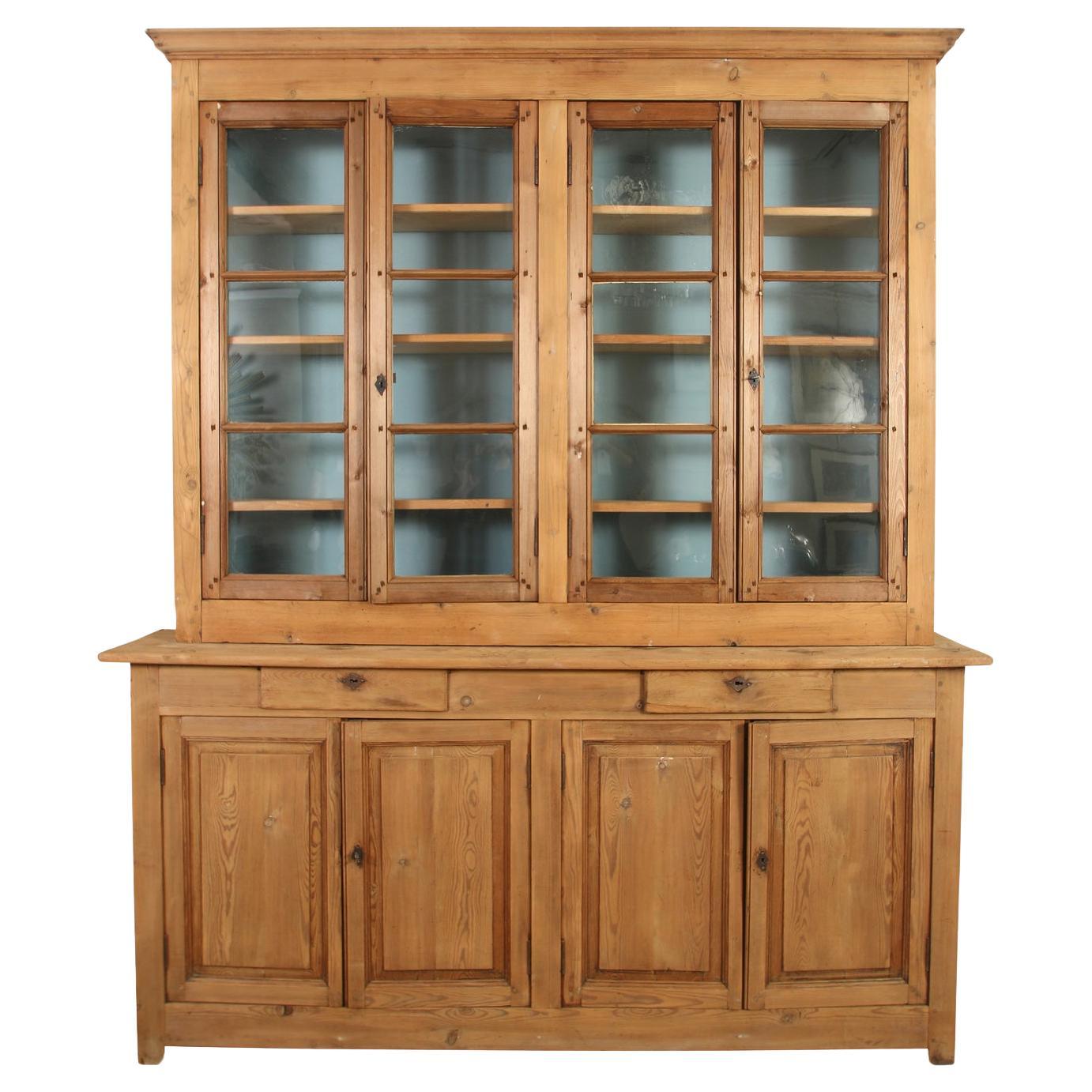A French Pine Bookcase with Four Doors For Sale