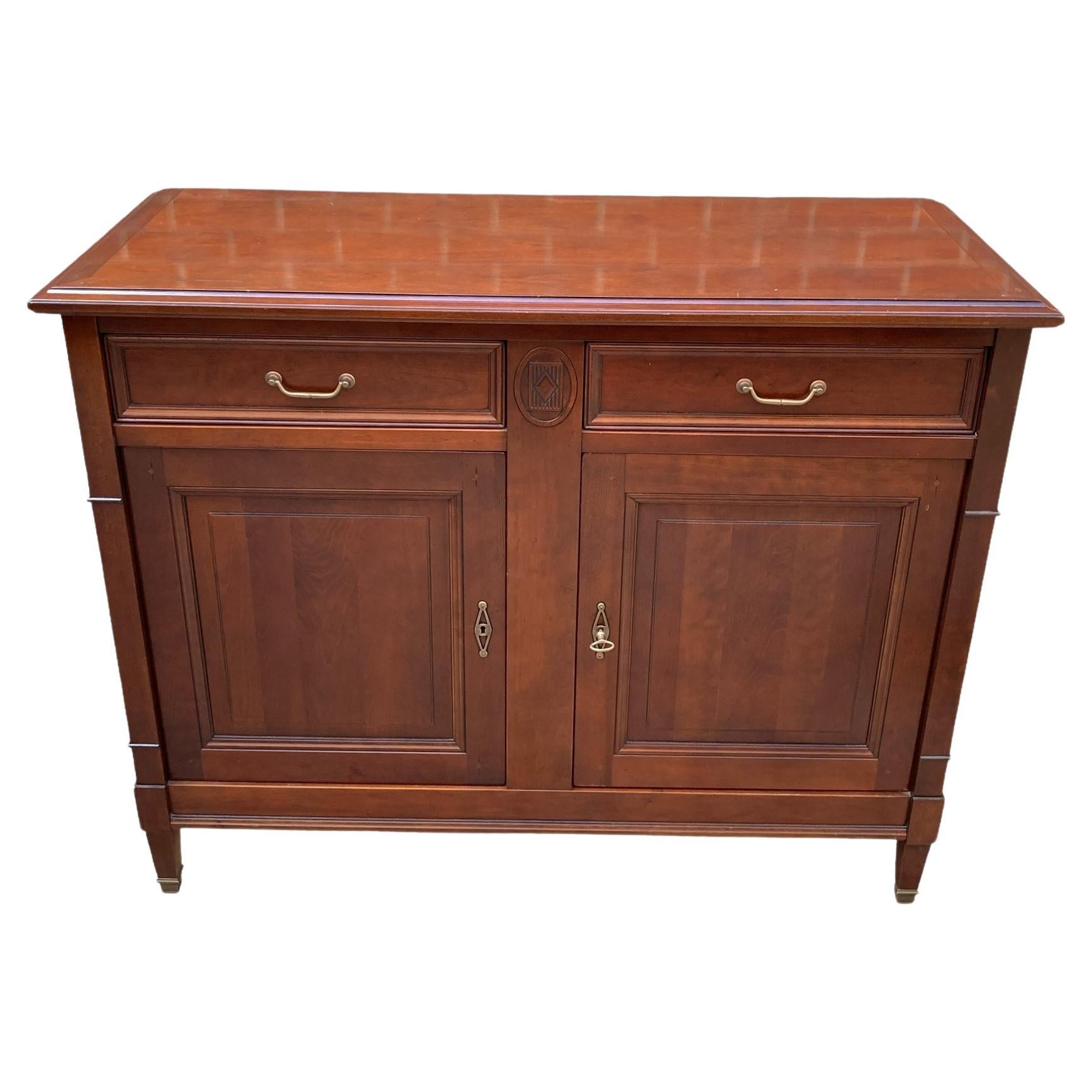 A French Provincial Grange Two Drawer Sideboard, server cabinet, cherry wood wit