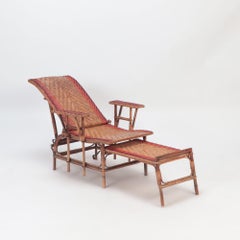 French Rattan Chaise Lounge with Orange and Red Stripes, circa 1900
