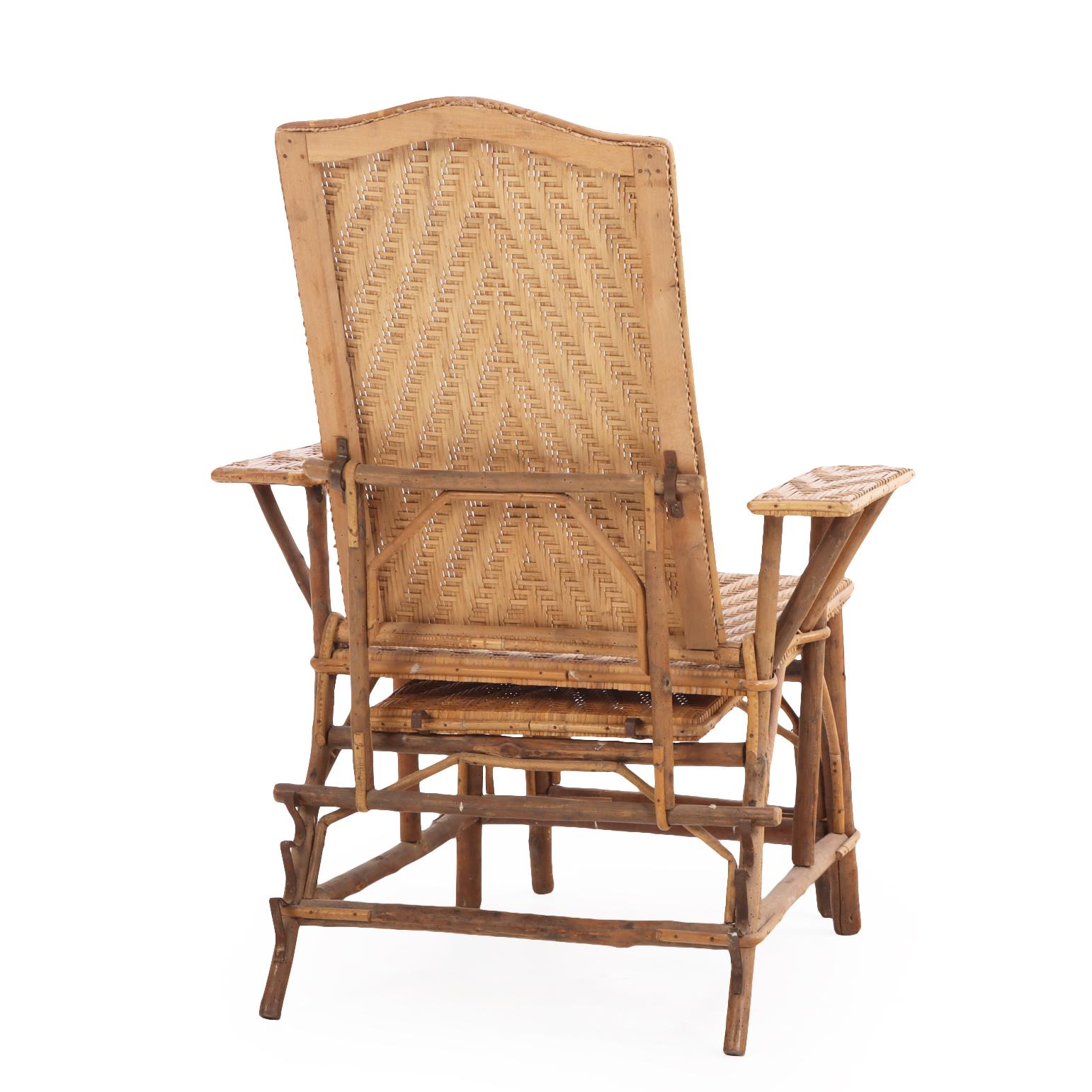 Woven A French rattan convertible chaise lounge, C. 1900. For Sale