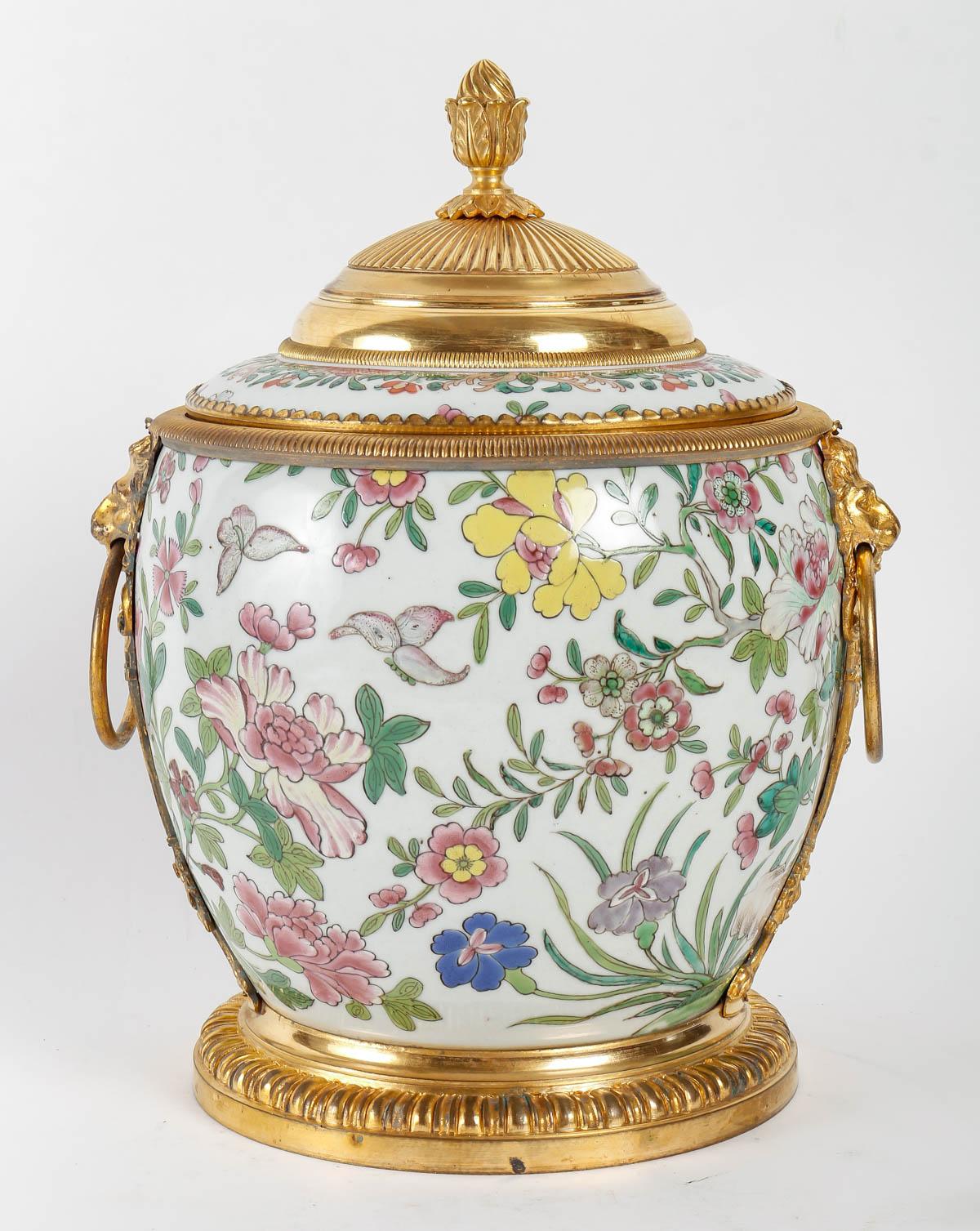 Gilt  A French Regence Style Ormolu-Mounted Chinese Porcelain Pair of Ginger Jar