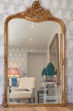 A French Rococo Giltwood Mirror with Bevelled Edge, Louis XV Period