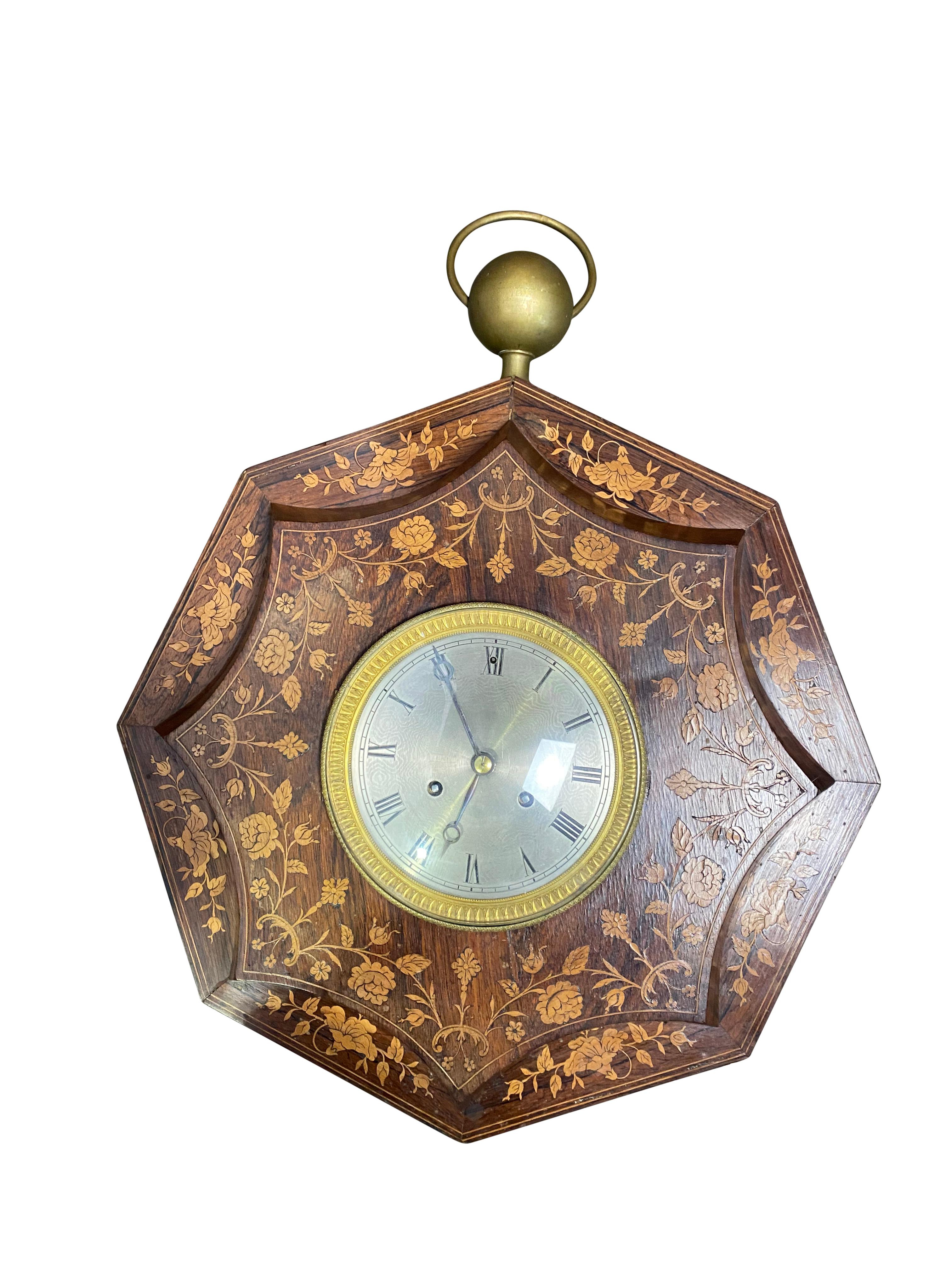 A French rosewood and boxwood cased wall clock, second quarter of the 19th century. The 6