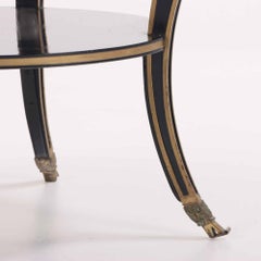 A French round marble top, ebonized and gilt table, C. 1940.