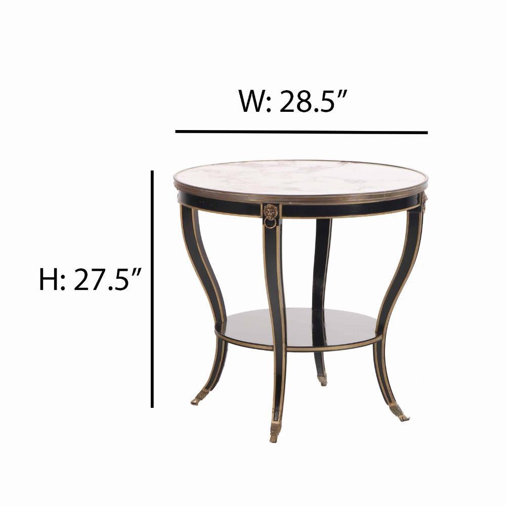 Ebonized A French round marble top, ebonized and gilt table, C. 1940. For Sale
