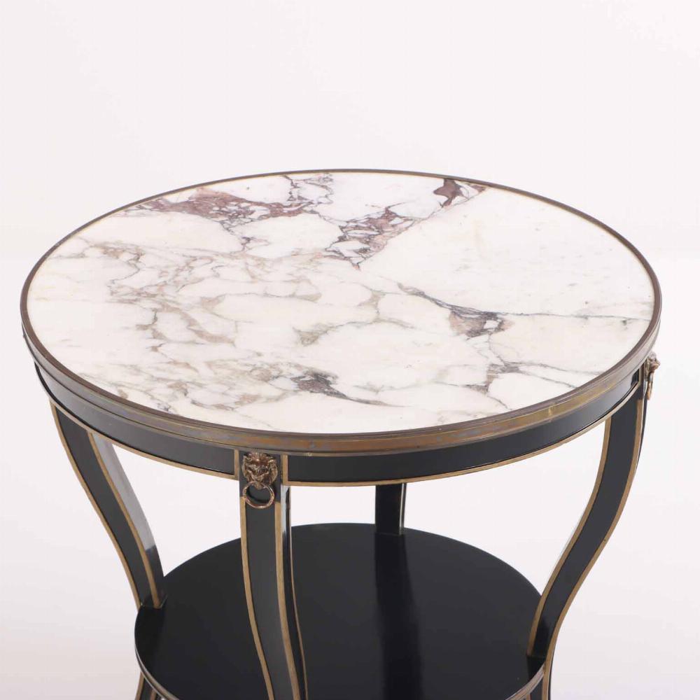 Mid-20th Century A French round marble top, ebonized and gilt table, C. 1940. For Sale