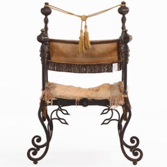A French Savonarola Style Iron and Bronze Chair, C. 1900.