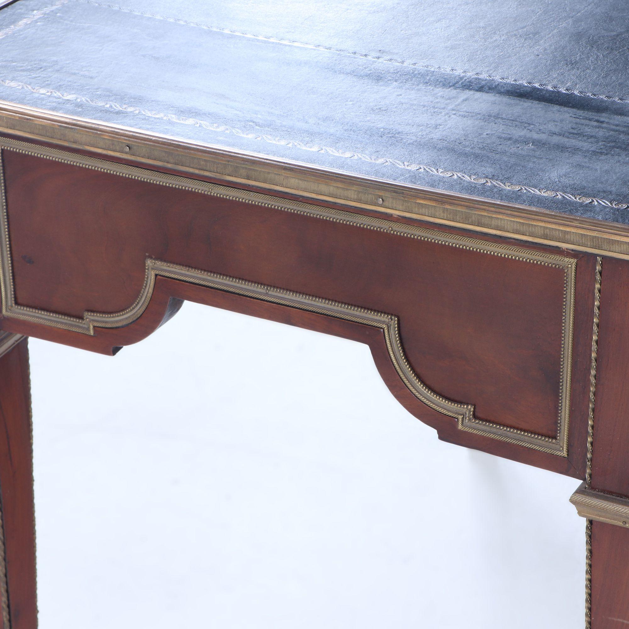 A French Louis XVI style three drawer mahogany bureau plat desk C 1930 In Good Condition For Sale In Philadelphia, PA