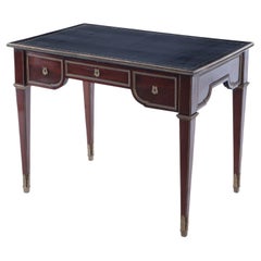 A French Louis XVI style three drawer mahogany bureau plat desk C 1930