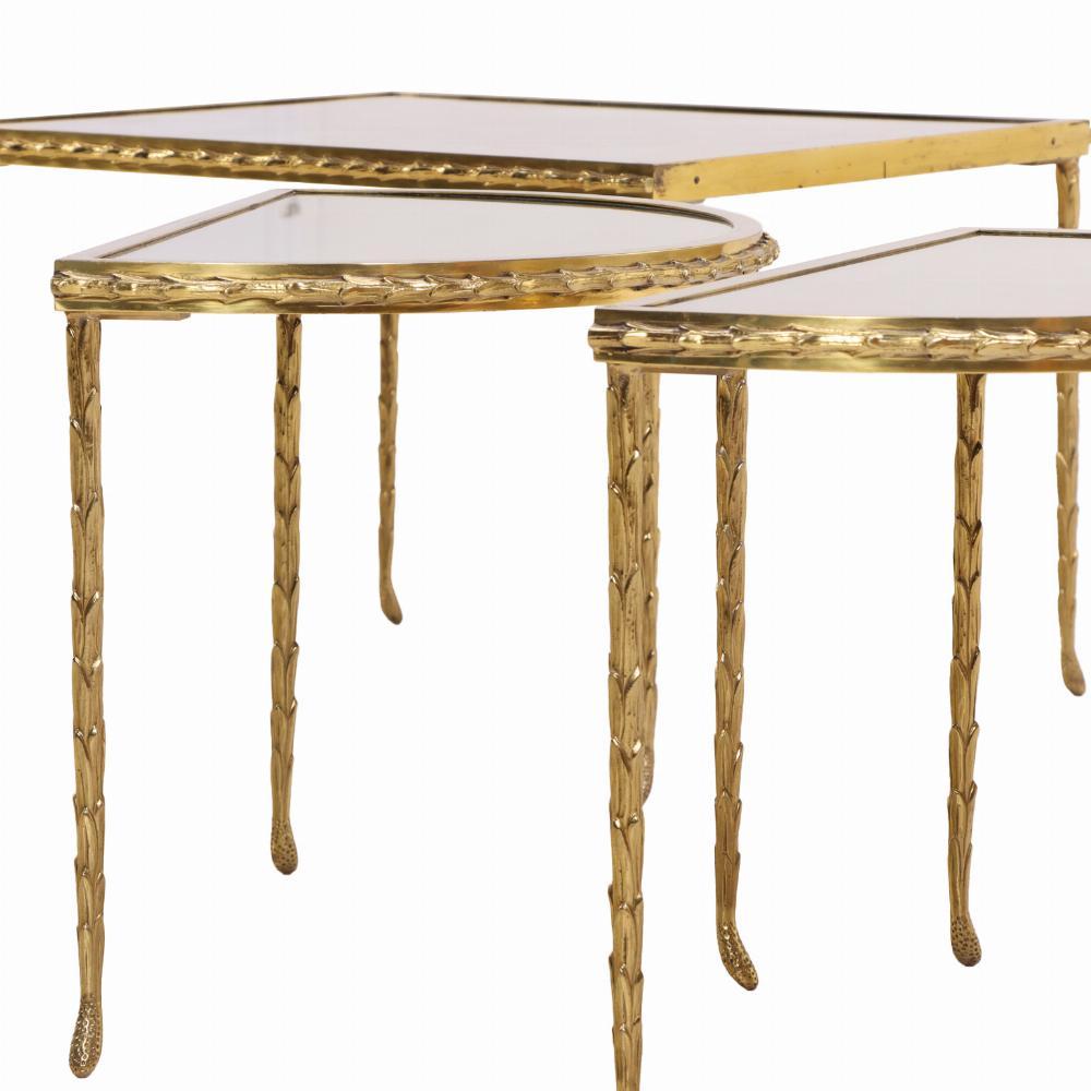 Gilt A French three-part gilt bronze coffee table, attributed to Bagues, C. 1960. For Sale
