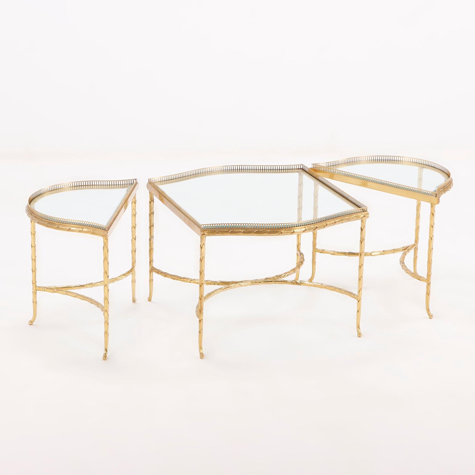 A French three-Part Gilt bronze and Glass Coffee Table attributed to Bagues C 1965.