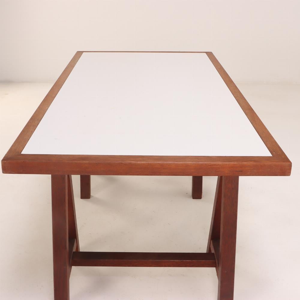 20th Century A French three-part solid mahogany architect's style desk, C. 1970. For Sale