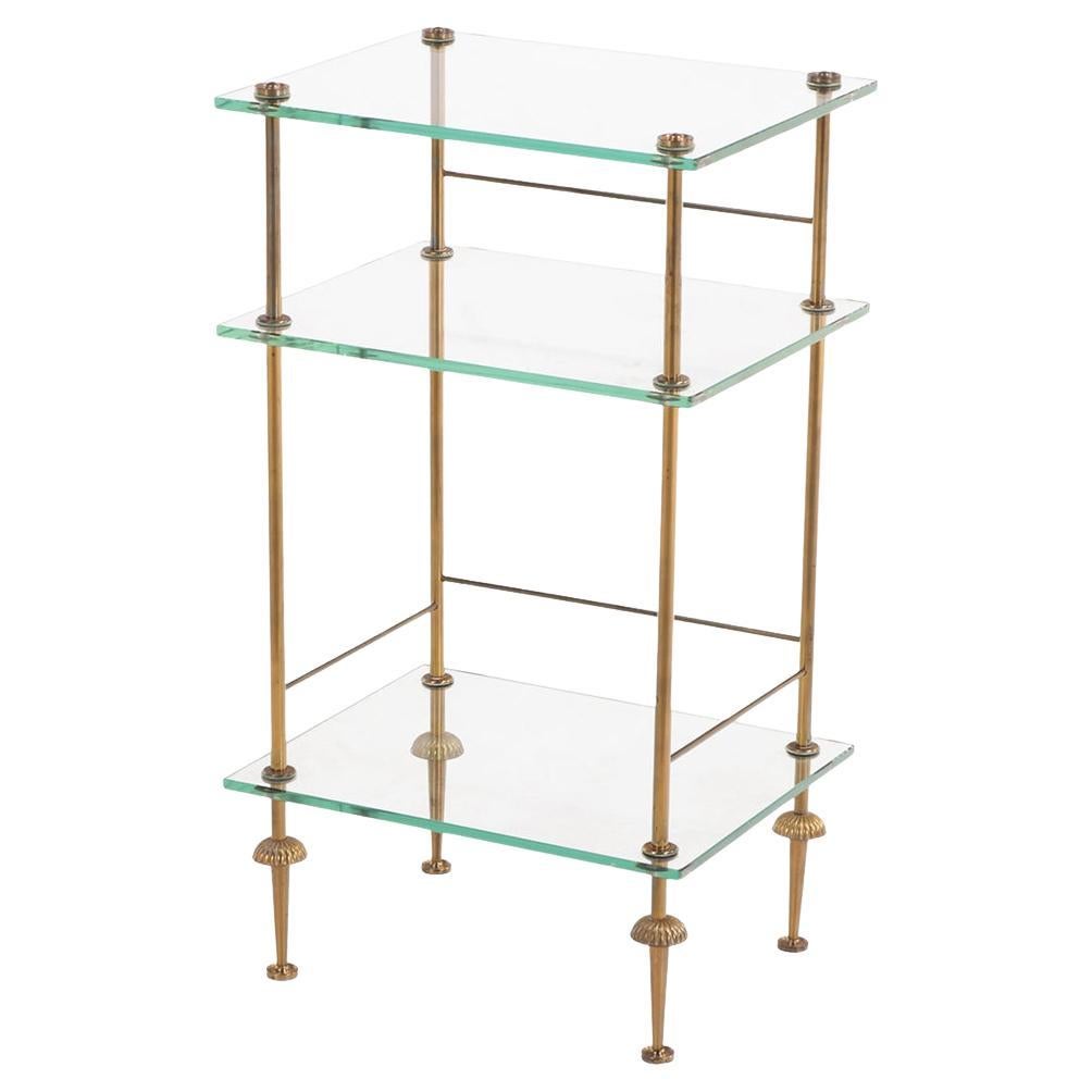 A French Three-Tier Brass and Glass End Table, C. 1950.