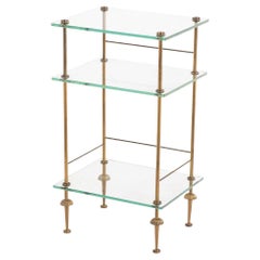 A French Three-Tier Brass and Glass End Table, C. 1950.