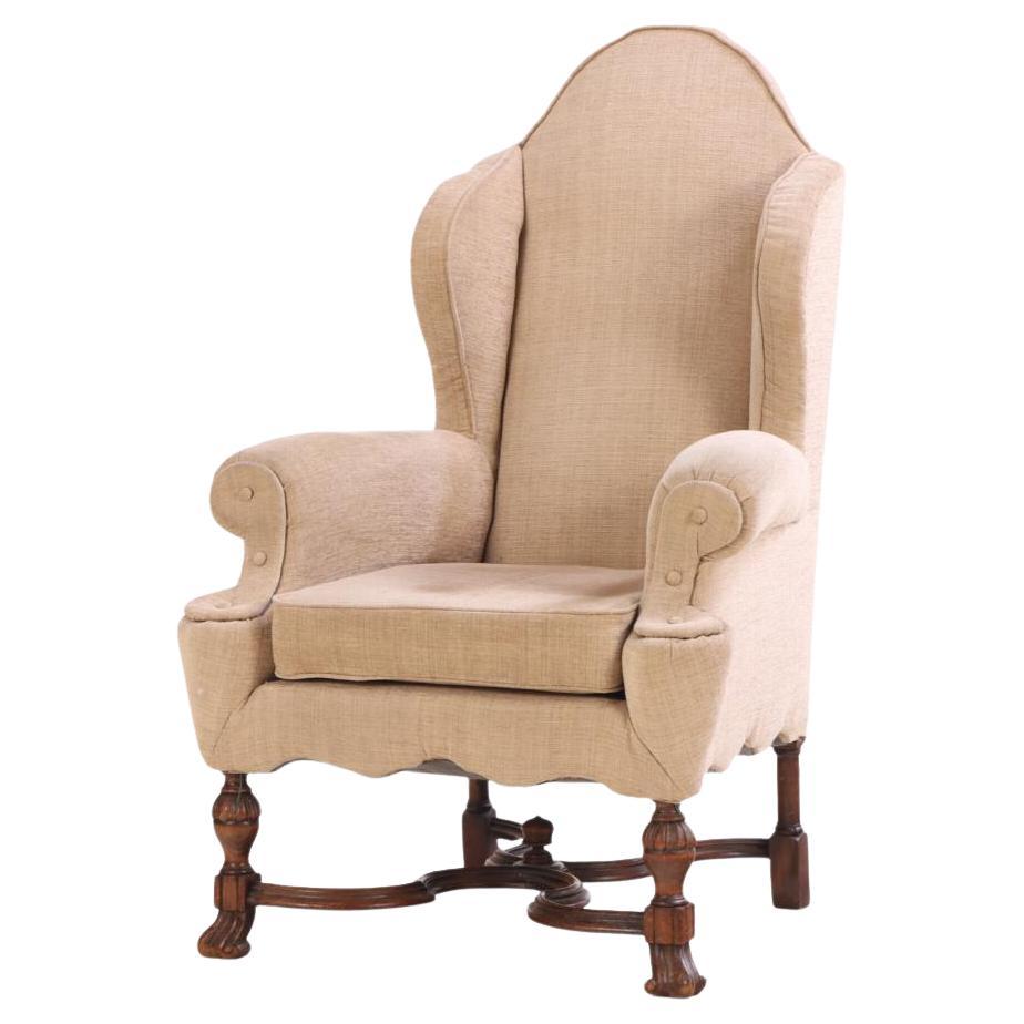 A French Tudor Style Walnut Wing Chair, C. 1900. For Sale