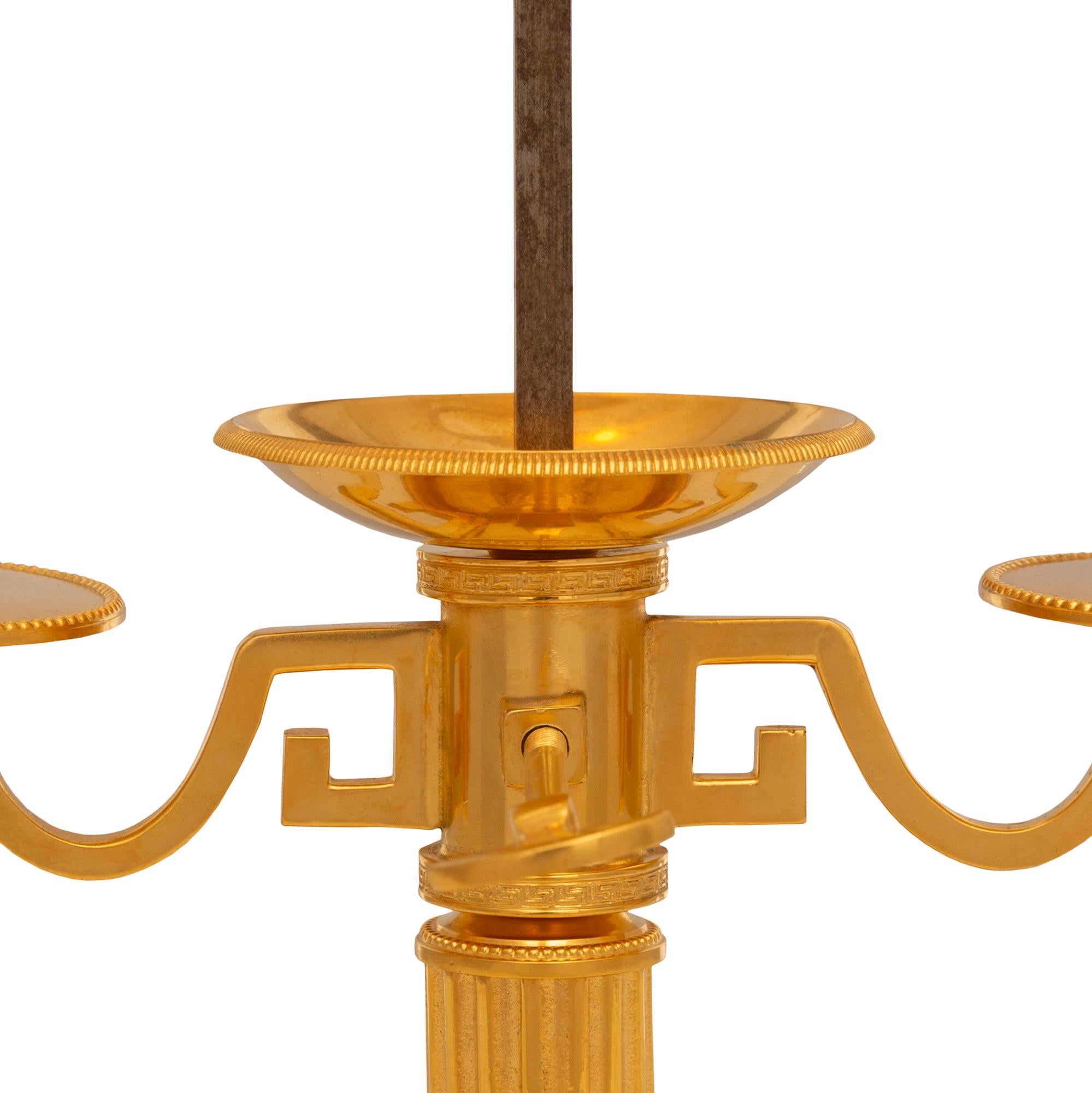 Ormolu A French turn of the century Louis XVI st. Bouillotte lamp For Sale
