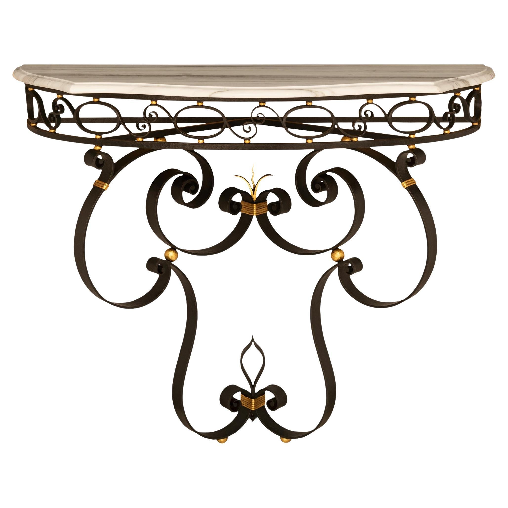 A French turn of the century Wrought Iron, Gilt Metal and marble console For Sale