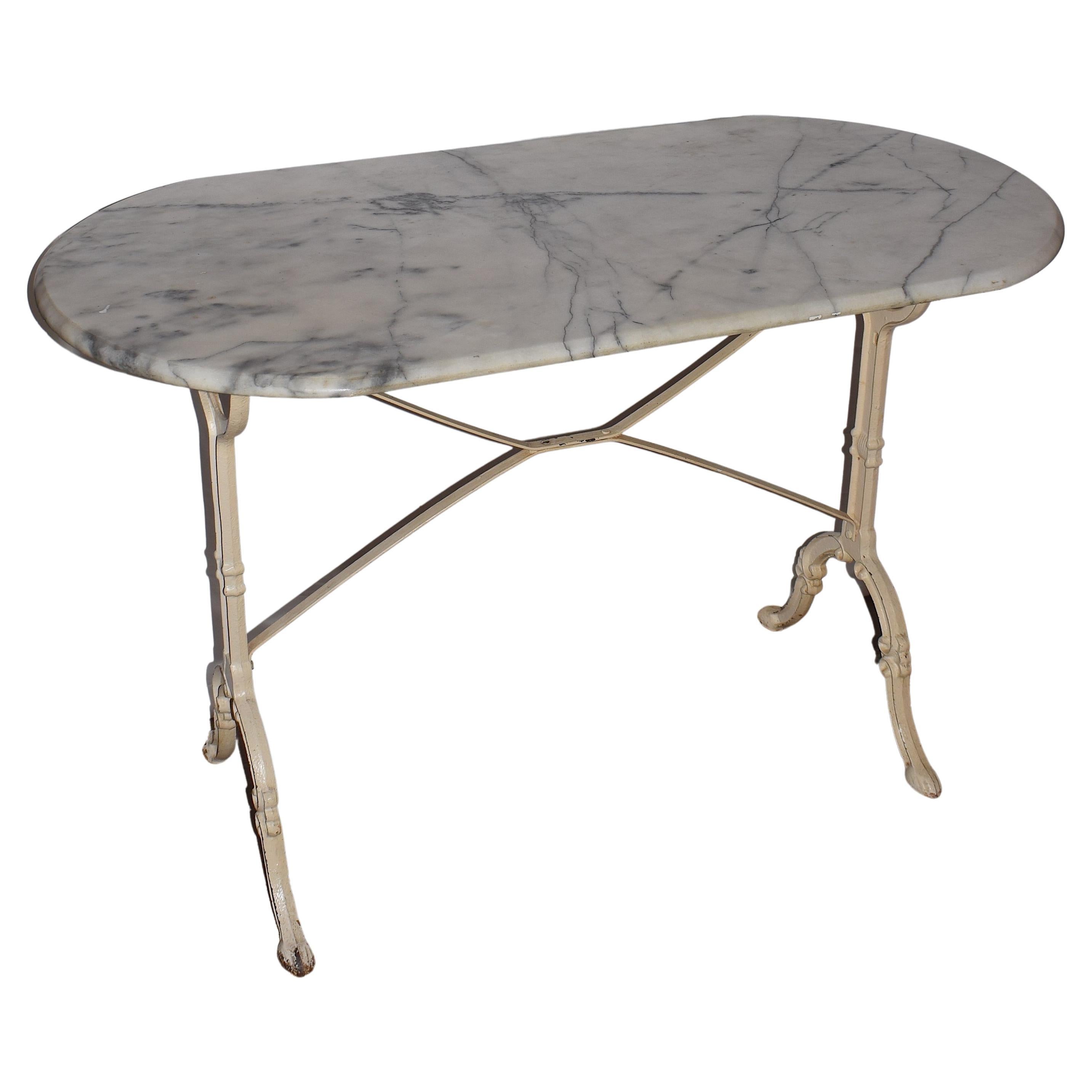 French, Vintage Bistro Table with a Oval Marble Top from the Early 20th  Century For Sale at 1stDibs