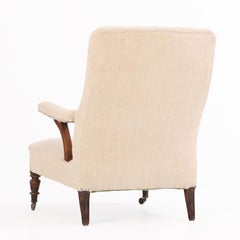 A French Walnut Floating-Arm Library Chair, C. 1860.