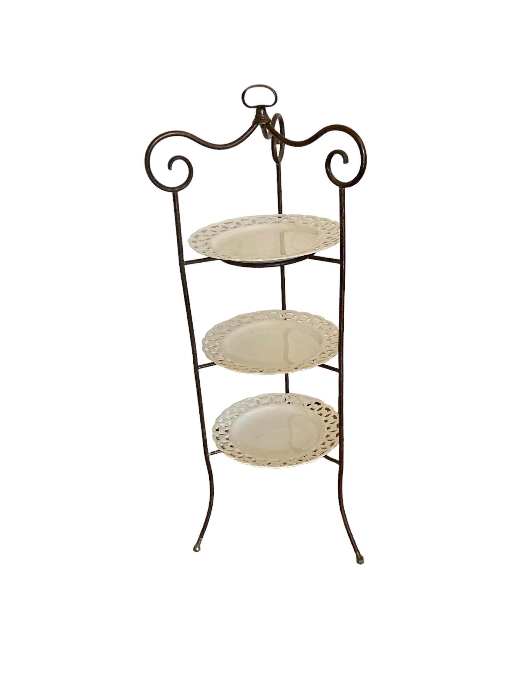 A French Wrought Iron three tier cake stand with ornate porcelain plates In Good Condition For Sale In Bishop's Stortford, GB