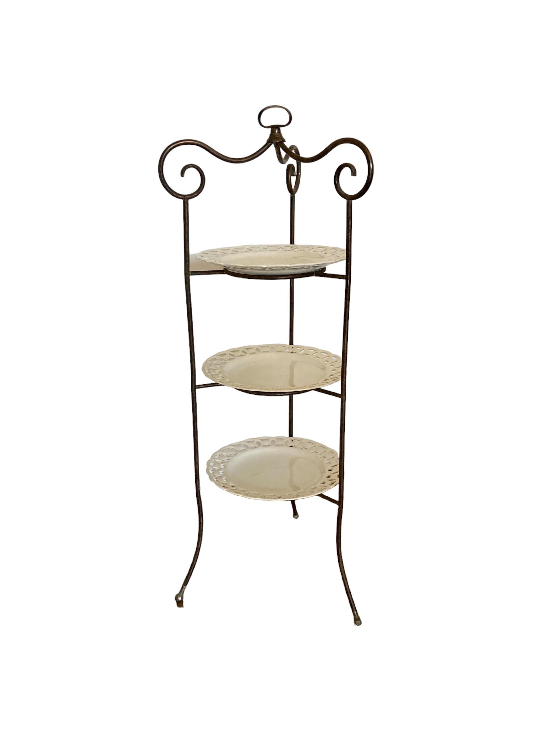 Early 20th Century A French Wrought Iron three tier cake stand with ornate porcelain plates For Sale