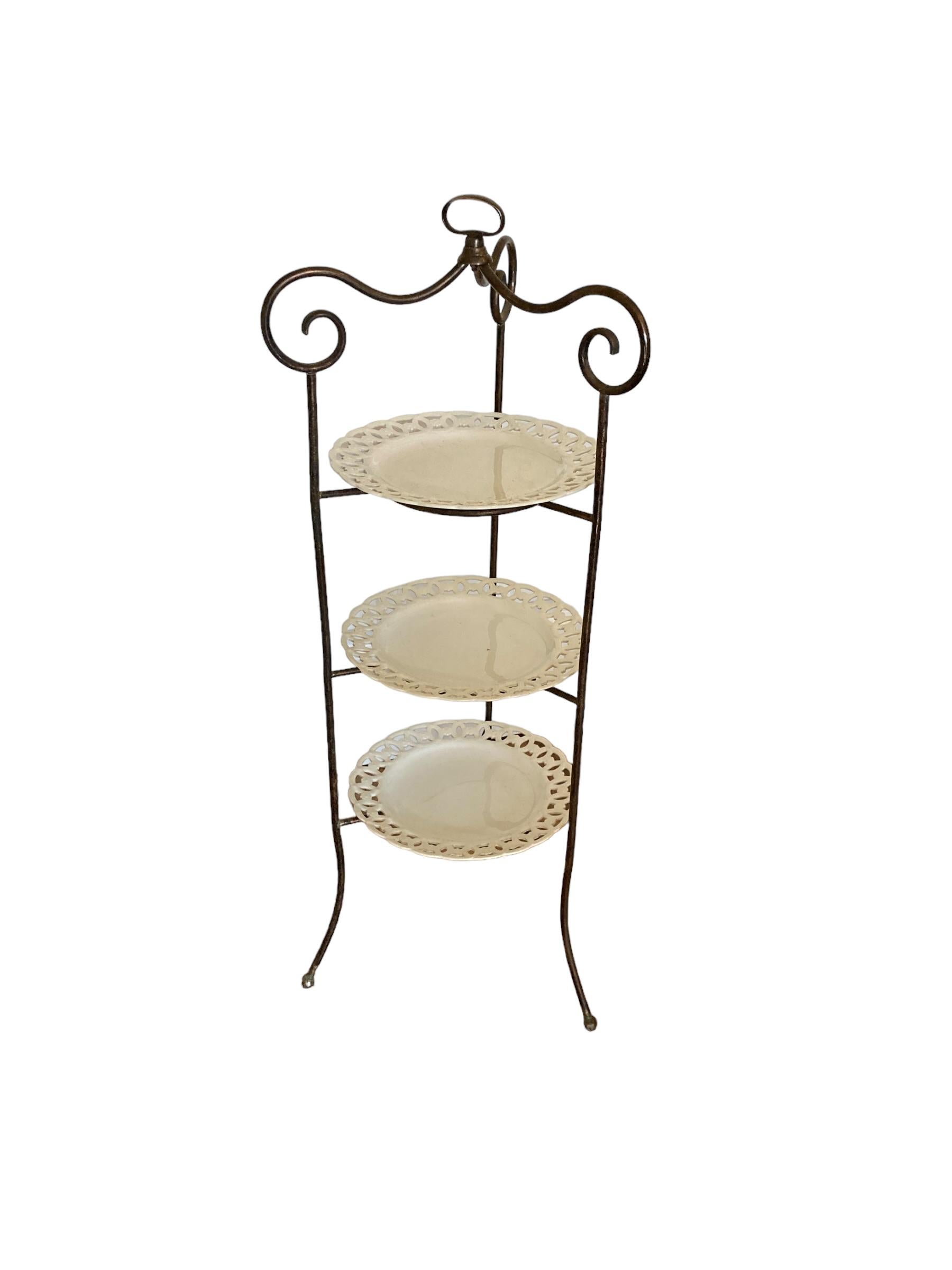 A French Wrought Iron three tier cake stand with ornate porcelain plates For Sale 1