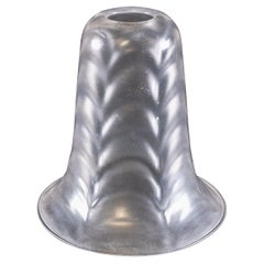 A Frosted Glass Shade with a Feather-Like Embossed Pattern & Flared Rim