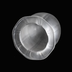 A Frosted Glass Shade with Subtle Vertical Ribbing & Flared Base