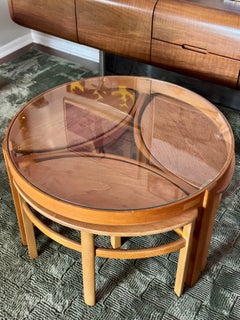 A functional Astro teak and glass coffee table by Nathan Furniture, circa 1960s