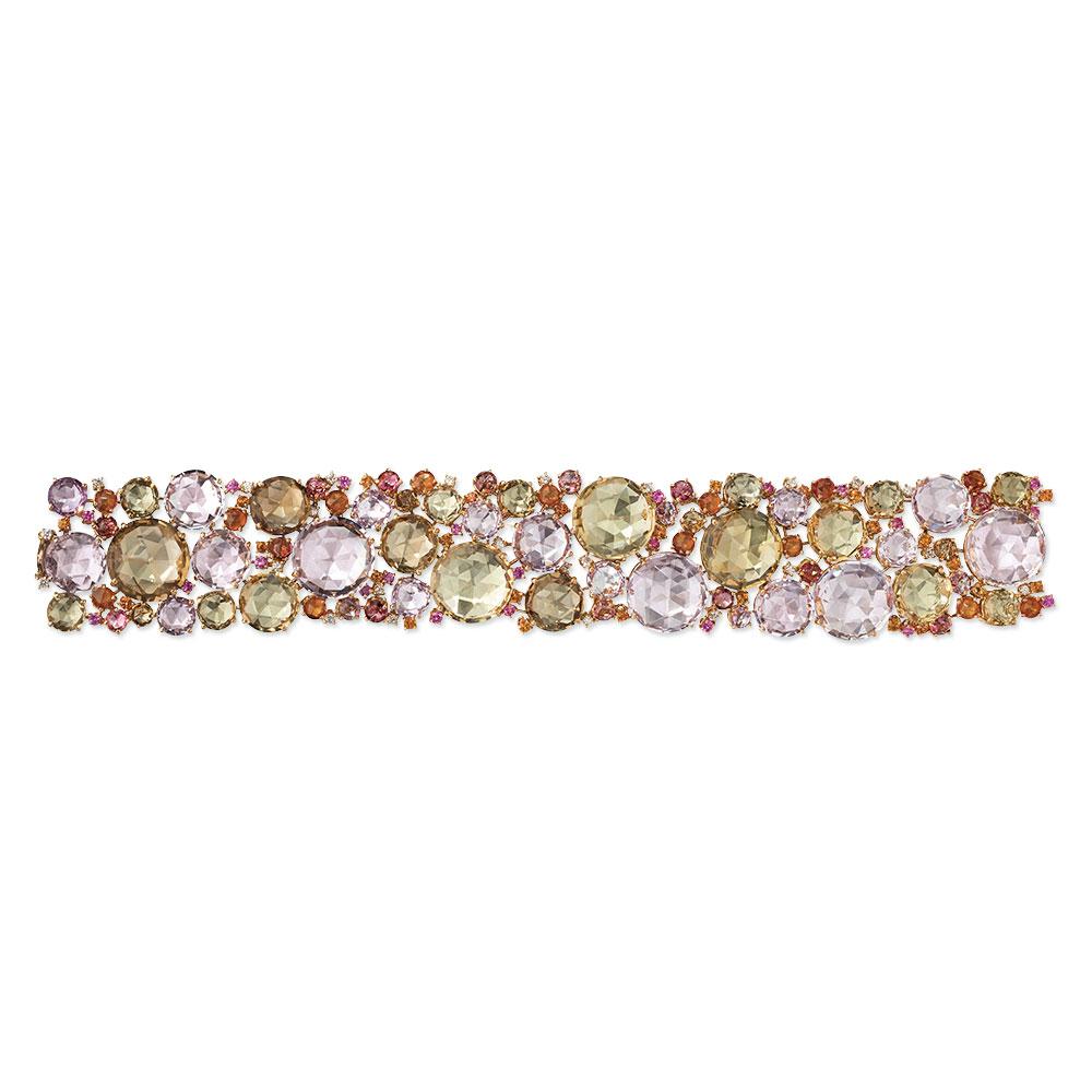 Designed by Carlo Antonini for A & Furst , third generation jewelers from Valenza ,Italy. This amazing 18 karat rose gold bracelet is from their signature Bouquet collection. The flexible bracelet is set with double rose cut spessartites, pink