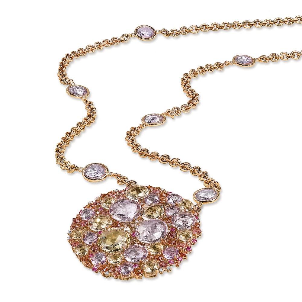 Designed by Carlo Antonini for A Furst , third generation jewelers from Valenza ,Italy. This amazing 18 karat rose gold pendant necklace is from their signature Bouquet collection. The large round pendant is set with double rose cut spessartites and