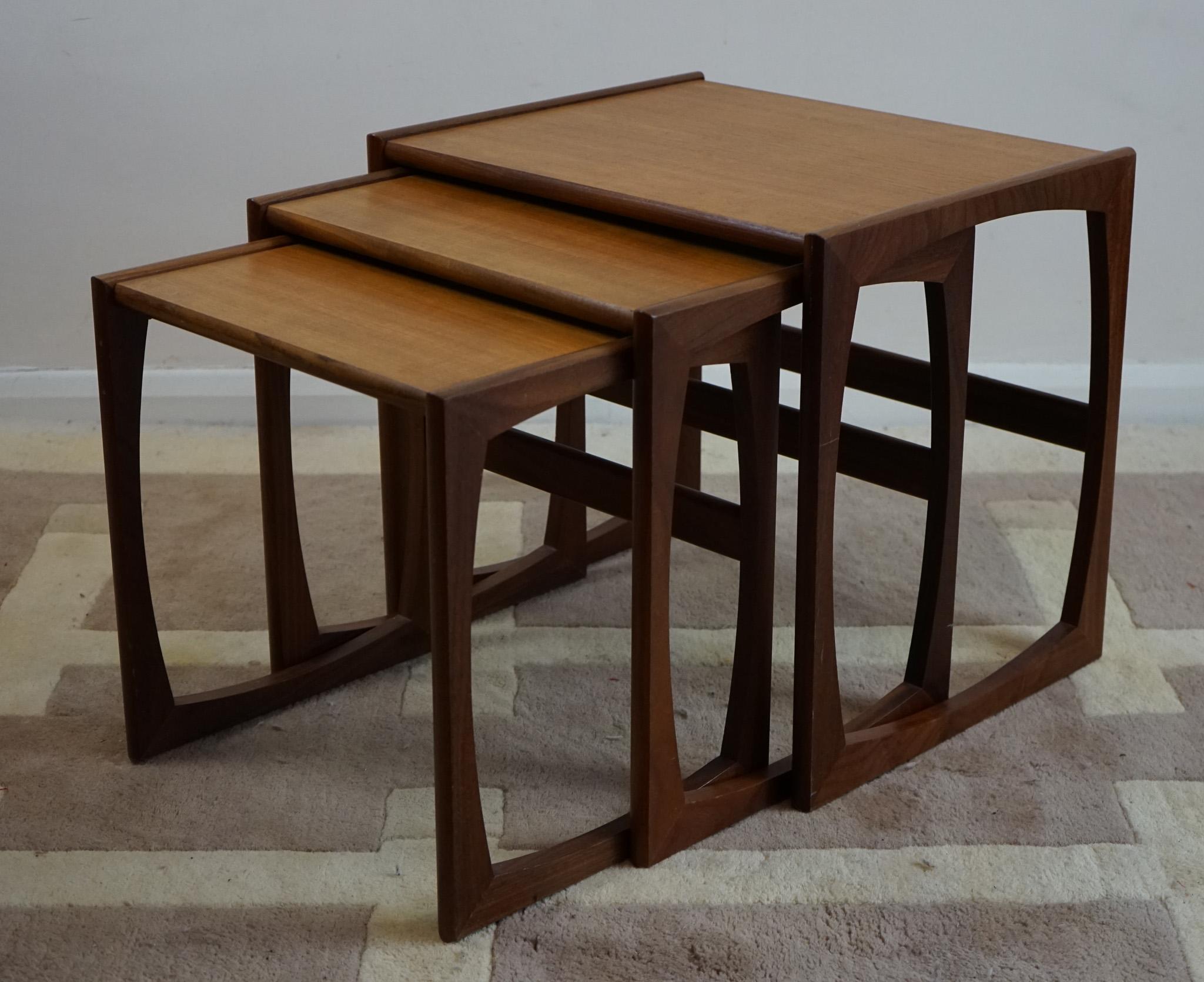 A G Plan Teak Nest Of Three Occasional Tables.


Three's a charm. A beautiful set of nesting tables / mimiset in beautiful teak. Particularly by the wood joints of the legs and the tight minimalist design. Country: United Kingdom. G-plan is known