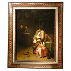 Une scène de galant, huile sur panneau attribuée à Van Mieris, 17e siècle.