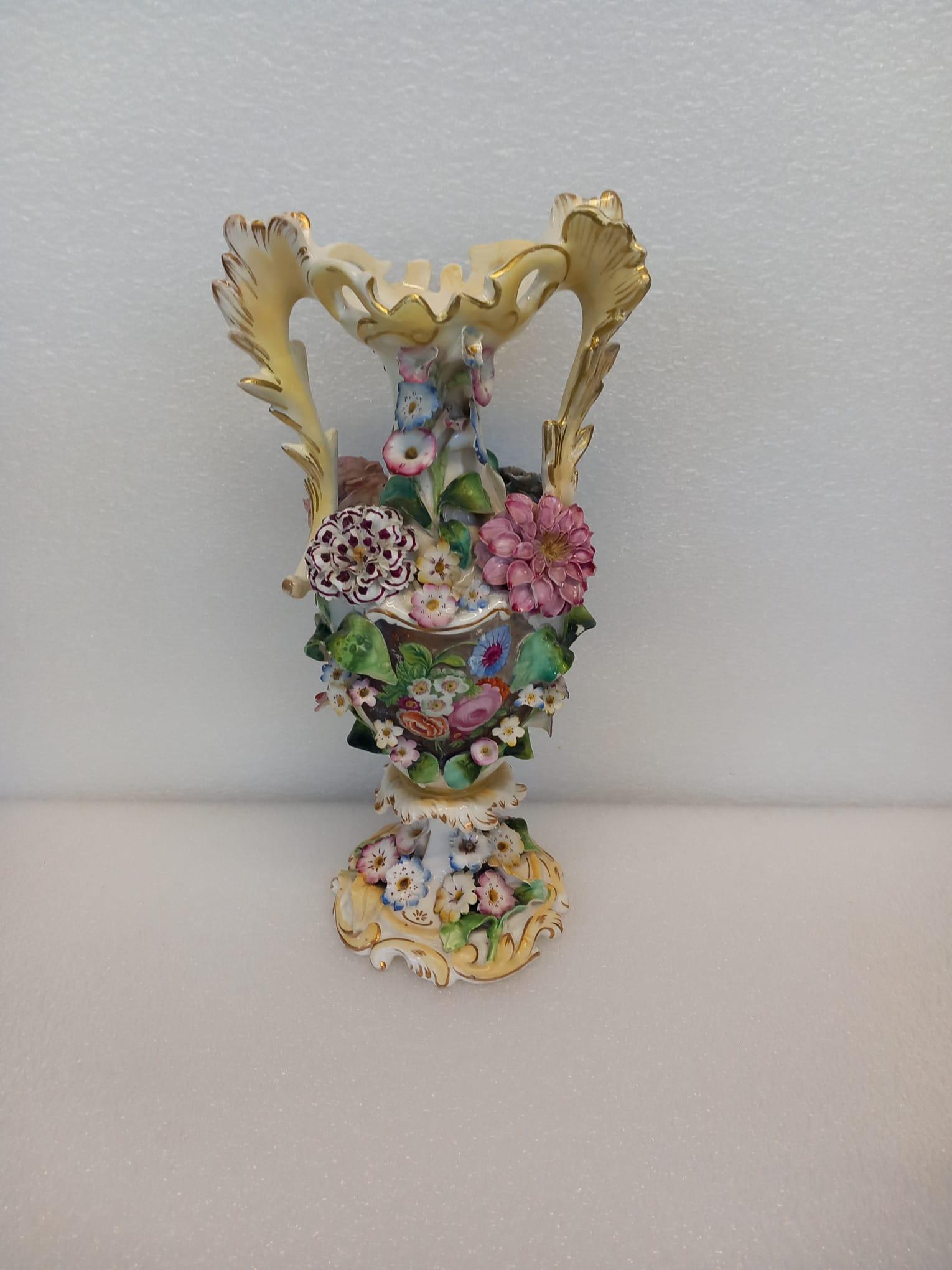Appliqué A garniture of three antique English porcelain vases, heavily decorated  For Sale