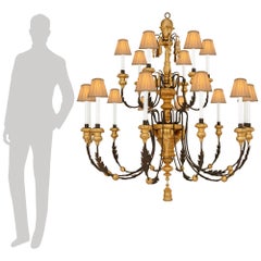 A Genovese early 18th century Baroque Period Giltwood and Iron chandelier