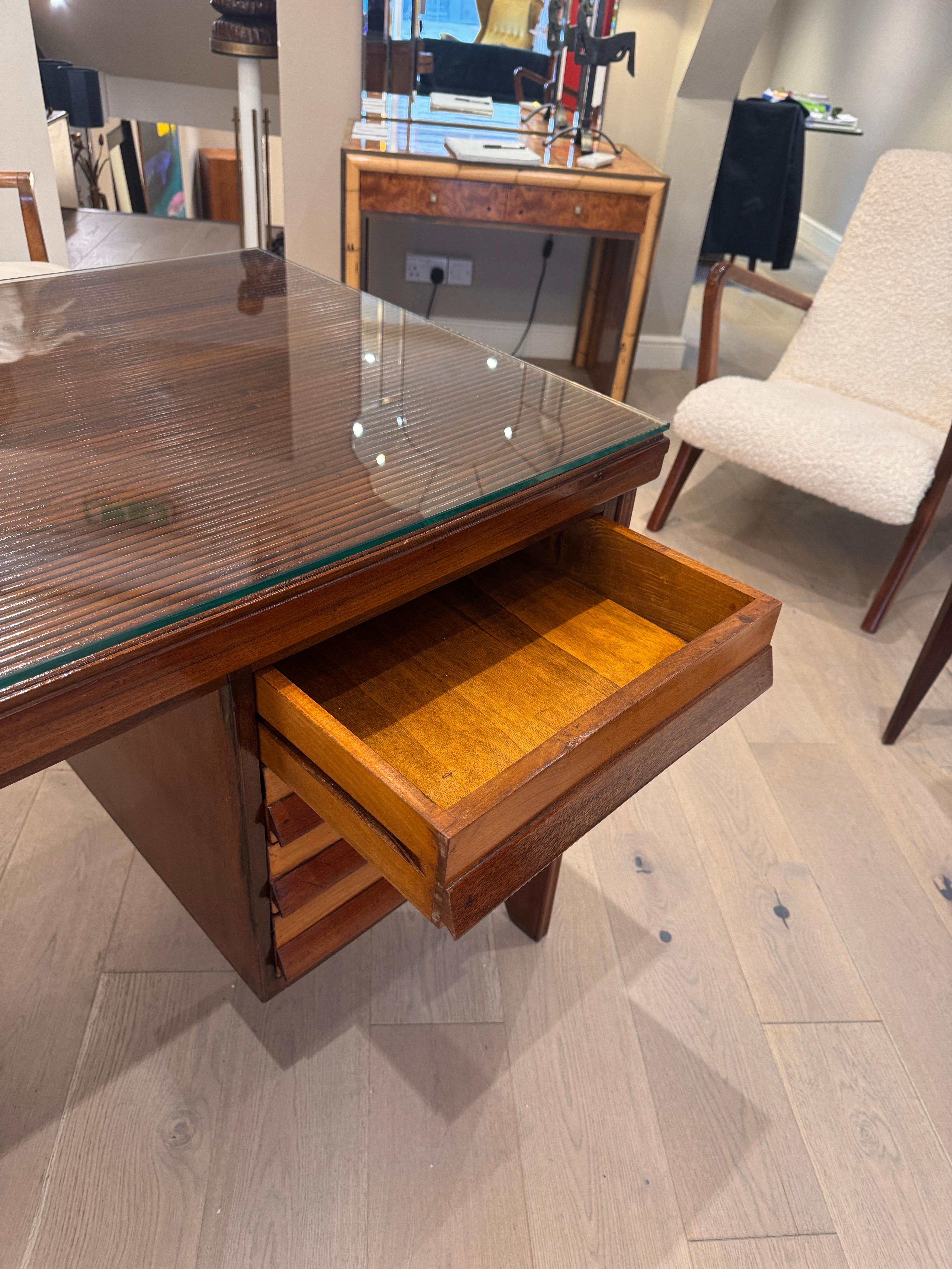 Italian A geometric design four drawers writing desk attributed to Silvio Cavatorta For Sale