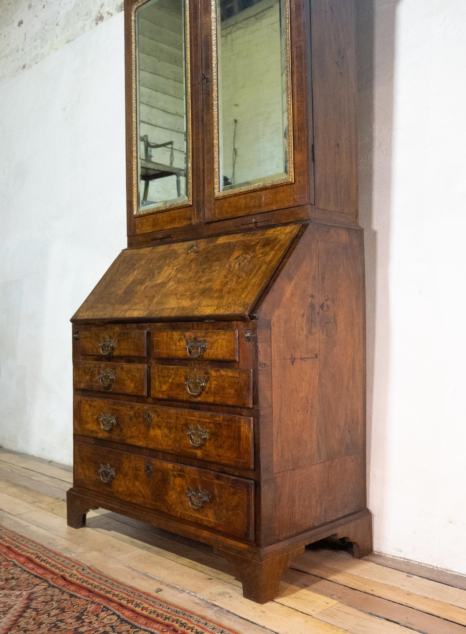 18th Century and Earlier An 18th Century George I Walnut & Feather Banded Fall Front Bureau Bookcase For Sale