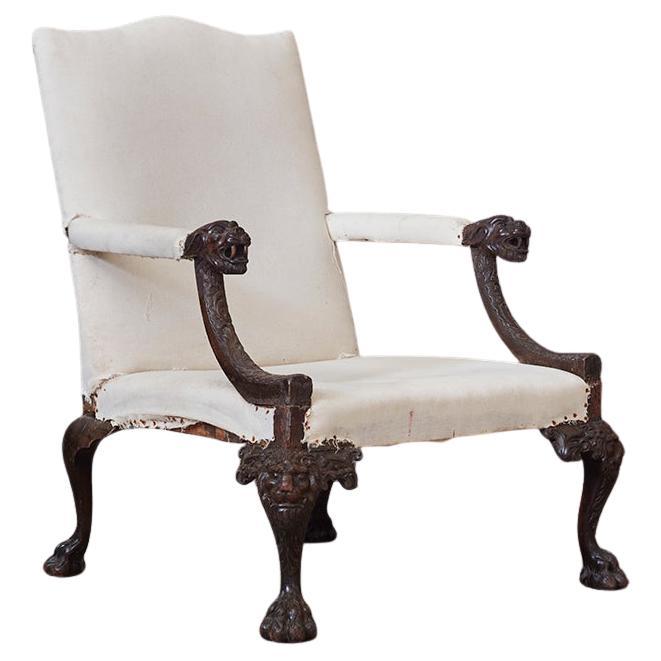 A George II Carved Mahogany Gainsborough Chair