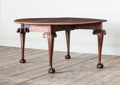 A George II Carved Mahogany Oval Gateleg Drop Leaf Table