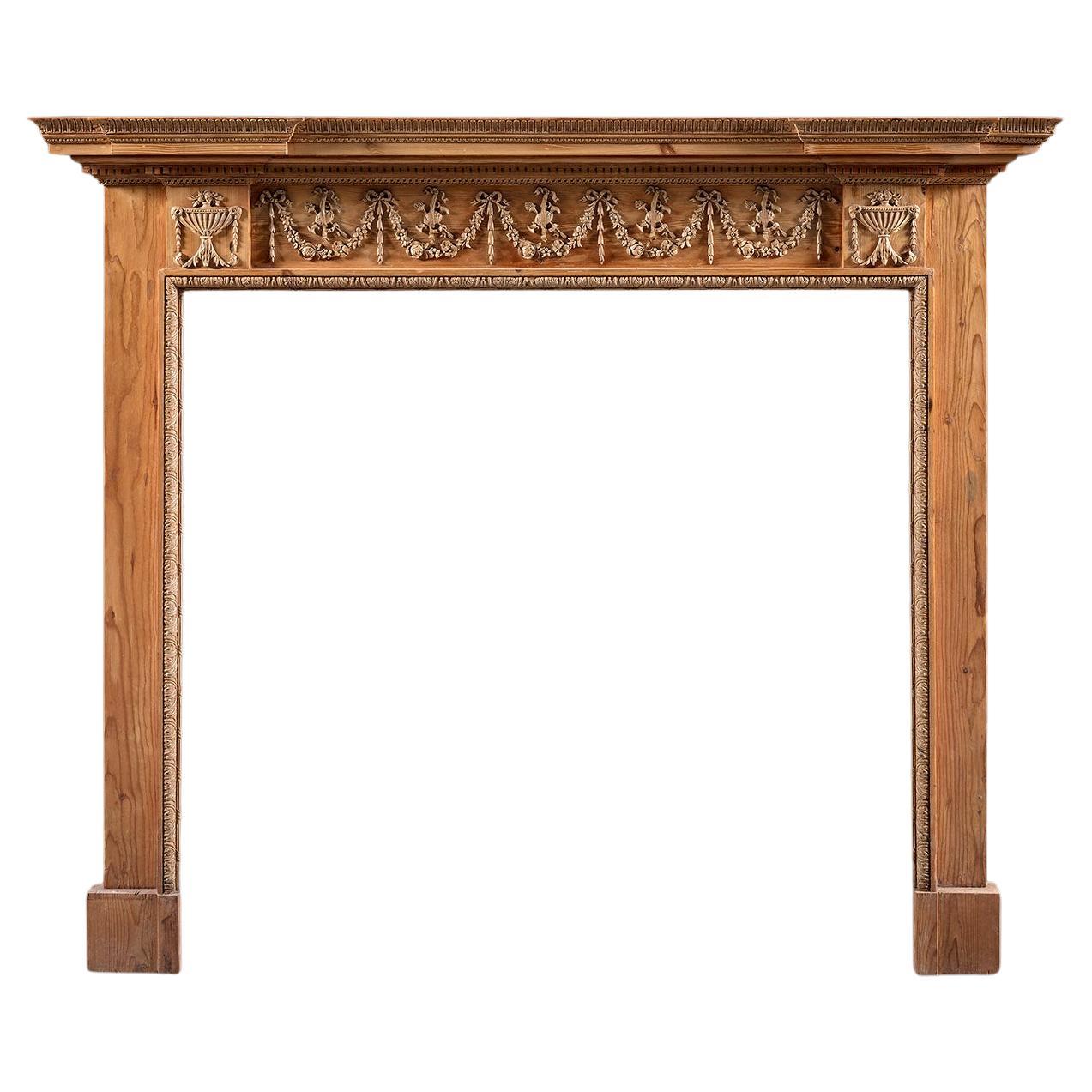 Cheminée George II en pin et tilleul sculpté