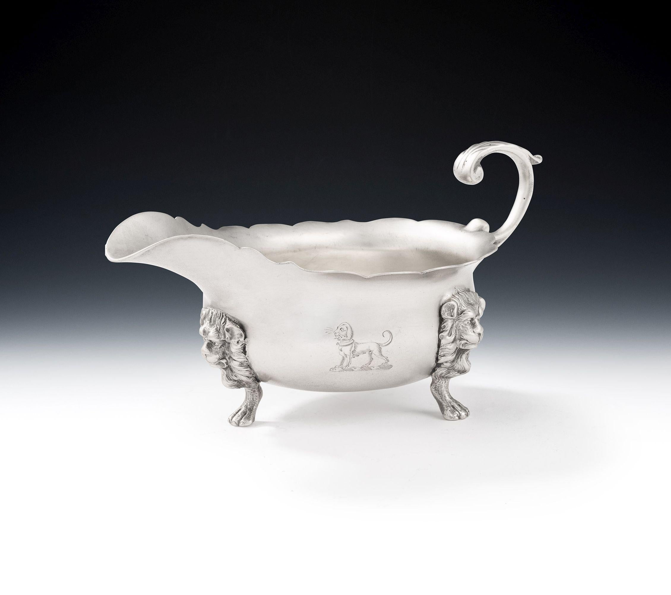 A VERY FINE GEORGE II CREAM BOAT MADE IN LONDON IN 1740 BY JOSEPH SANDERS.

The Creamboat has an elongated, shallow, form which rises to an everted and shaped rim. The main body stands on three very finely detailed paw feet with majestic lion mask