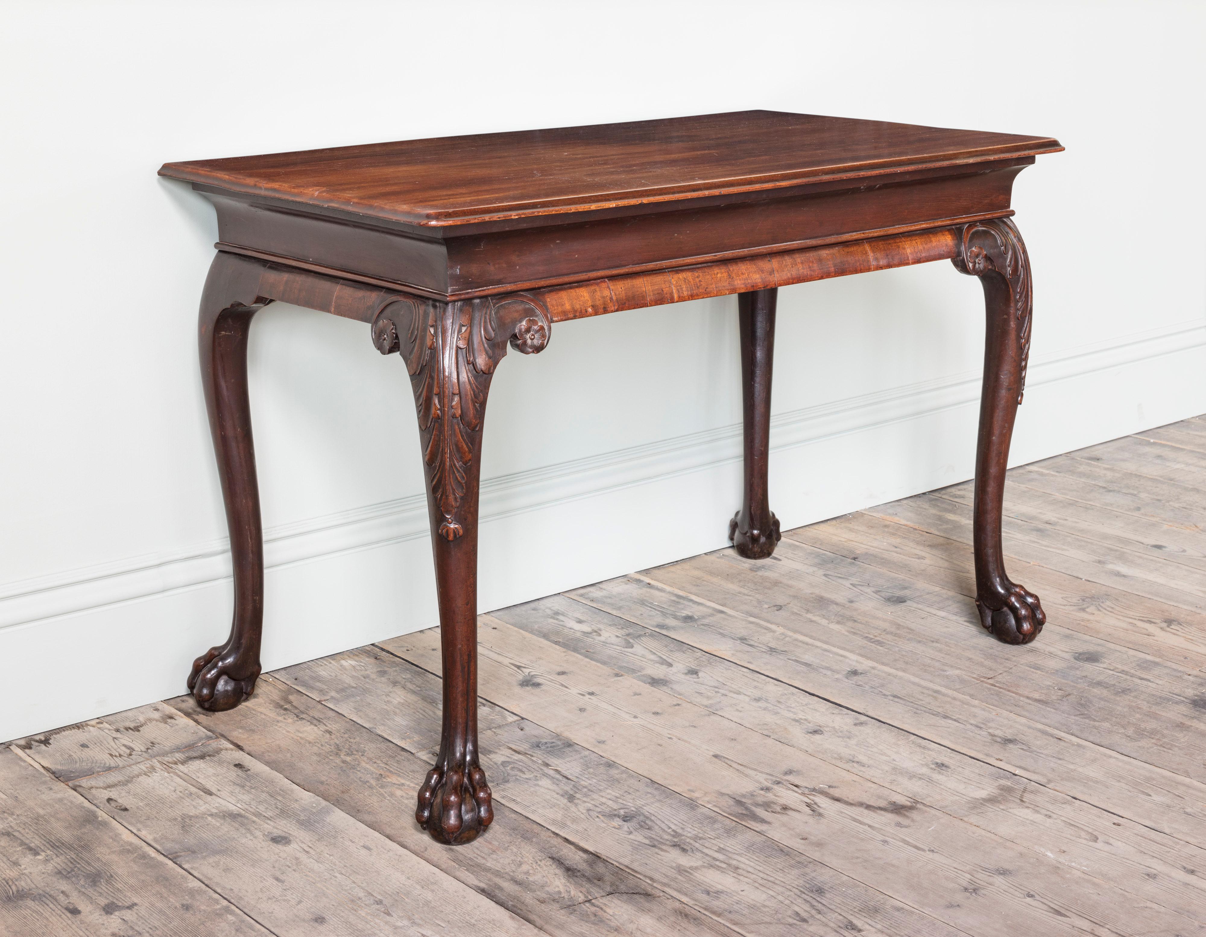 A George II Mahogany Console Table

With well figured mahogany top, above plain frieze on leaf carved cabriole legs and ball and claw feet.

Width: 122 cm, 48″
Height: 81 cm, 31 7/8″
Depth: 70 cm, 27 1/2″

