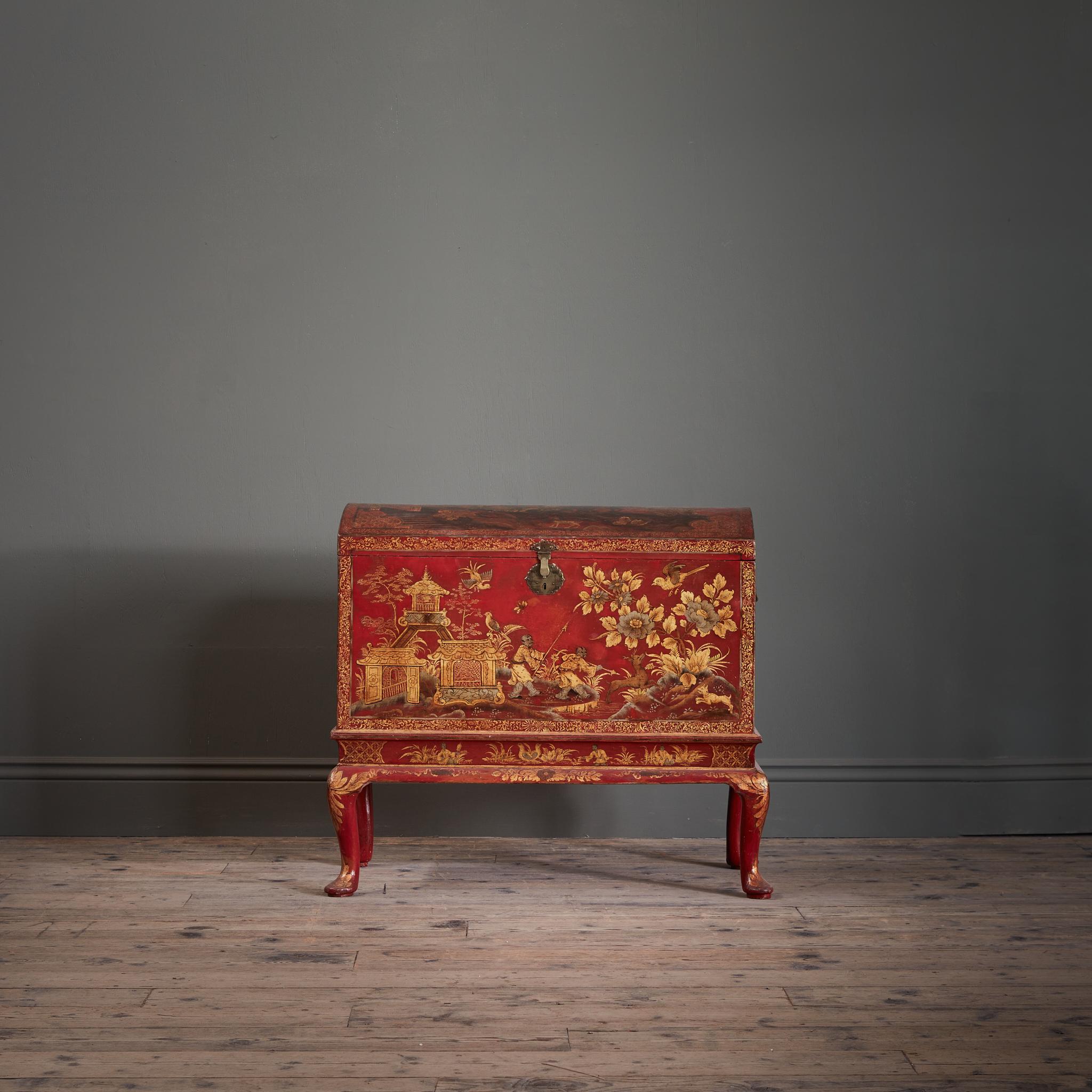 Of perfectly modest form, with a domed lid decorated with dignitaries on their horses, accompanying hounds, long tailed exotic pheasants, butterflies, all set within a landscape with lush flowers and a remarkable pavilion, with original brass lock