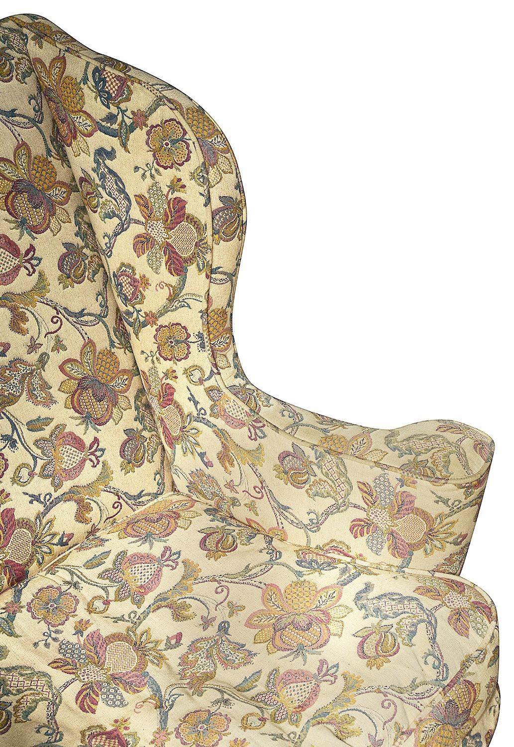 Hand-Carved George II Style Walnut Wingback Armchair For Sale