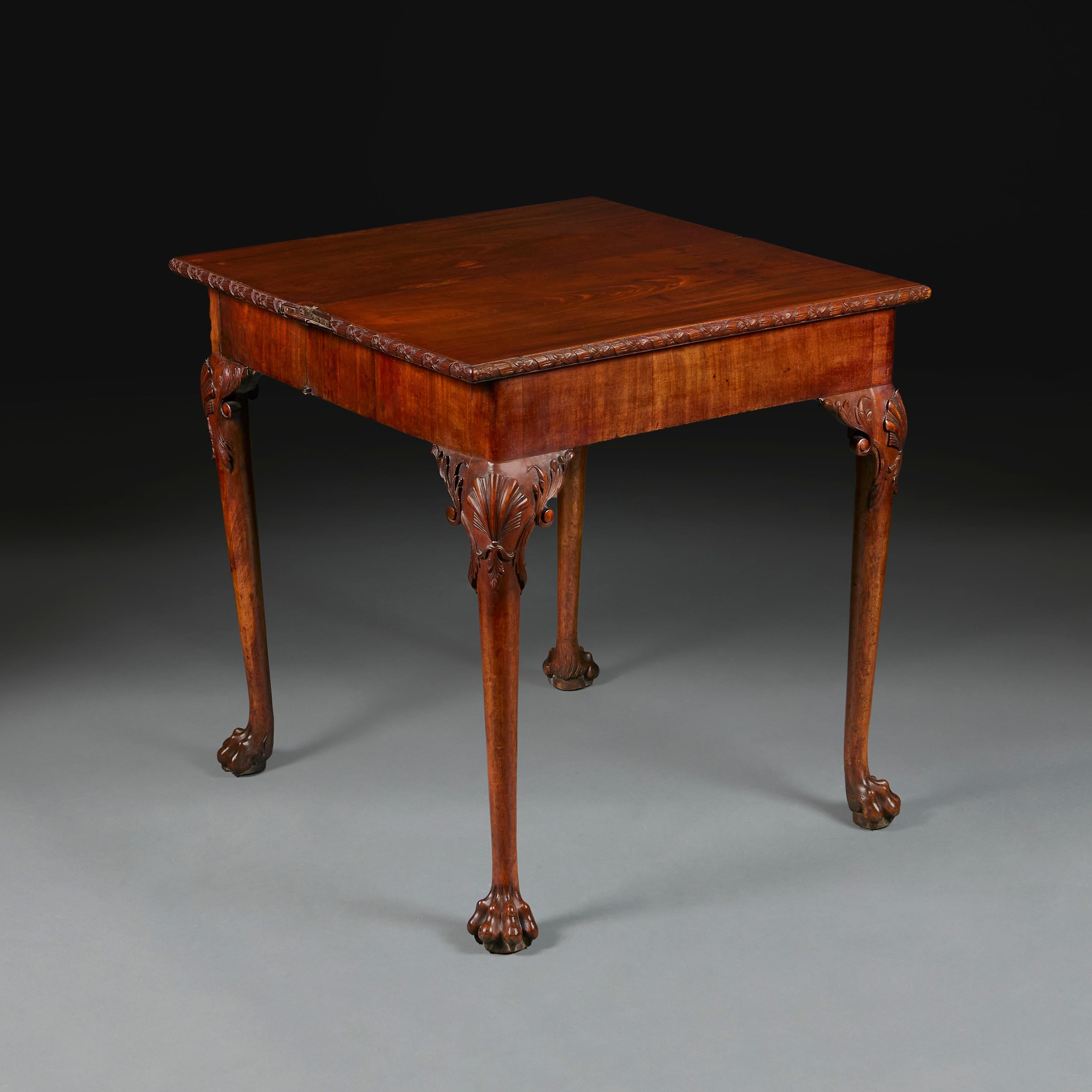 Hand-Carved A George II Tea Table with Concertina Mechinism