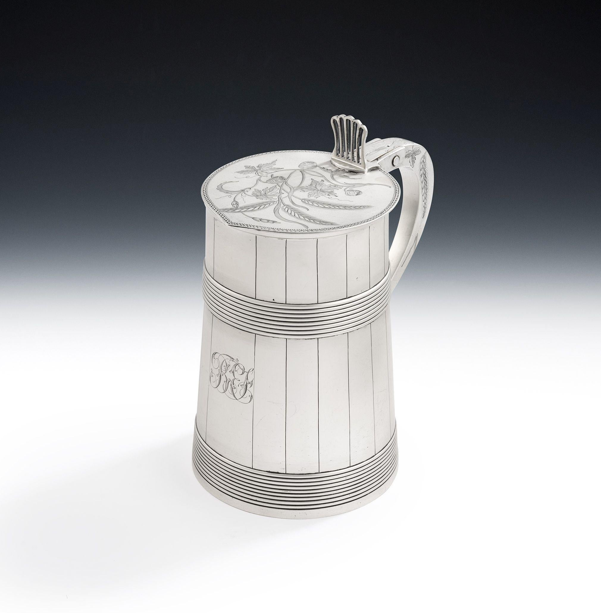 AN EXCEPTIONALLY RARE GEORGE III COOPERED BEER TANKARD MADE IN LONDON IN 1776 BY ROBERT MAKEPEACE I & RICHARD CARTER.

The Tankard is modelled to simulate a coopered beer barrel with slightly tapering sides engraved with vertical lines to simulate