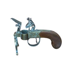 A George III Brass, Iron and Mahogany Flintlock Tinder Pistol