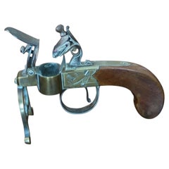 A George III Brass, Iron and Mahogany Flintlock Tinder Pistol