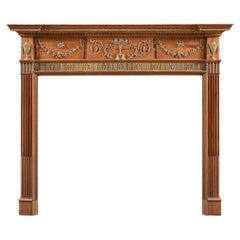 A George III Carved Pine and Gesso Chimneypiece