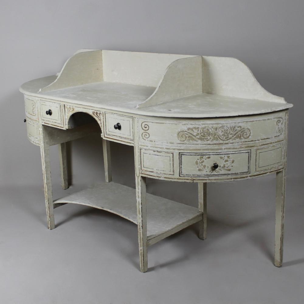 A truly wonderful, George III, country house, dressing table or double washstand. Dry scraped back to its original paint and decoration, standing on elegant tapered legs and with four drawers,
English, circa 1780.